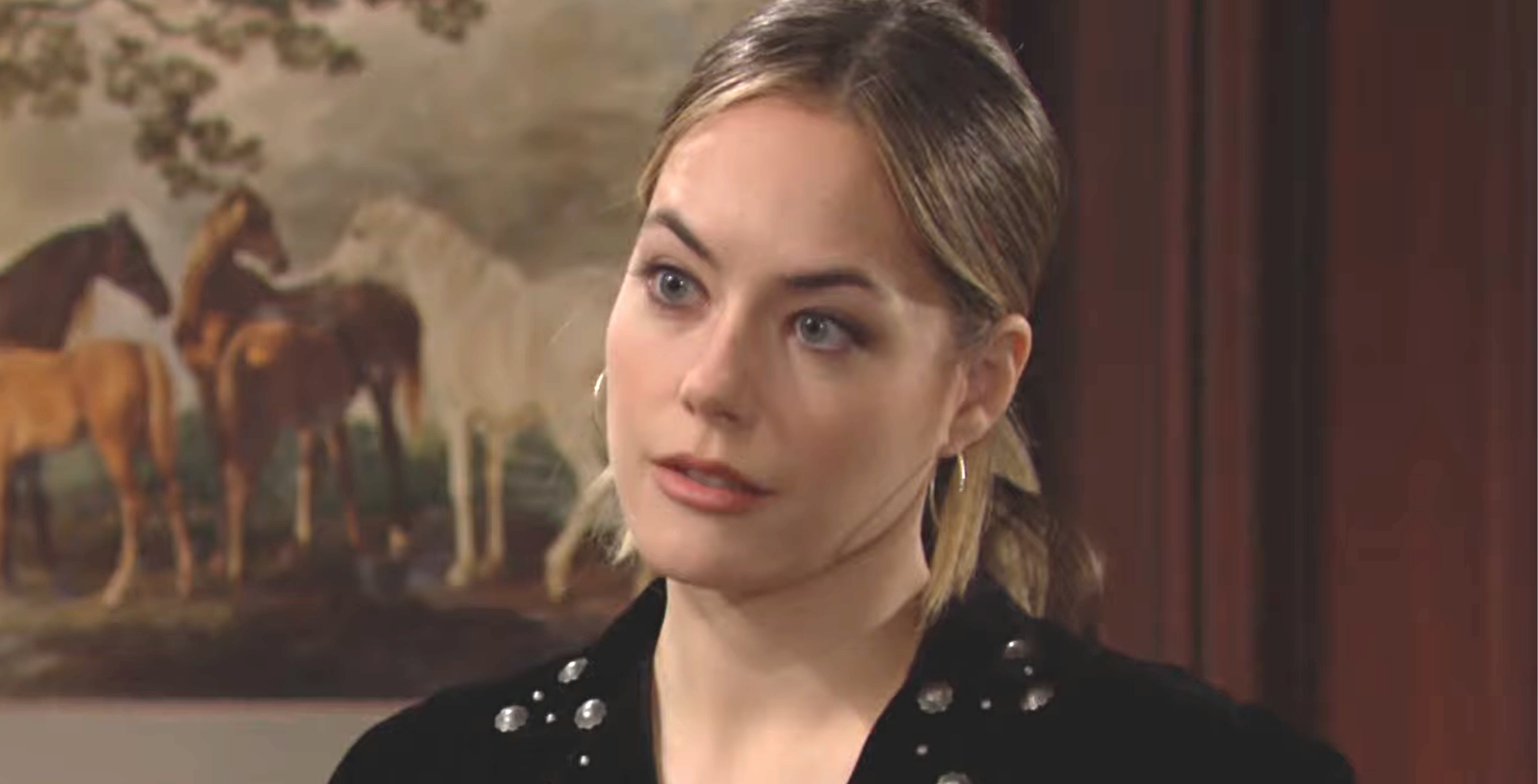 bold and the beautiful spoilers hope logan spencer standing against a wall, a painting behind her