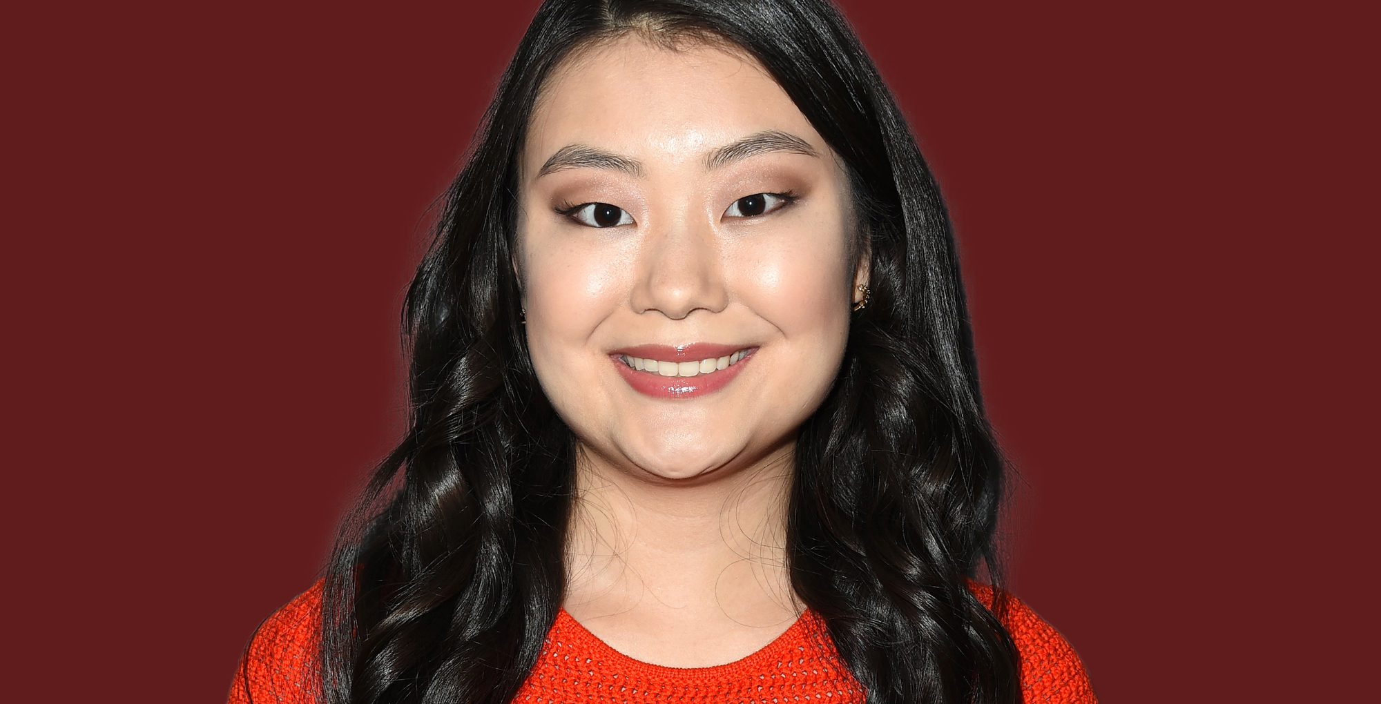 victoria grace of days of our lives against a red background.