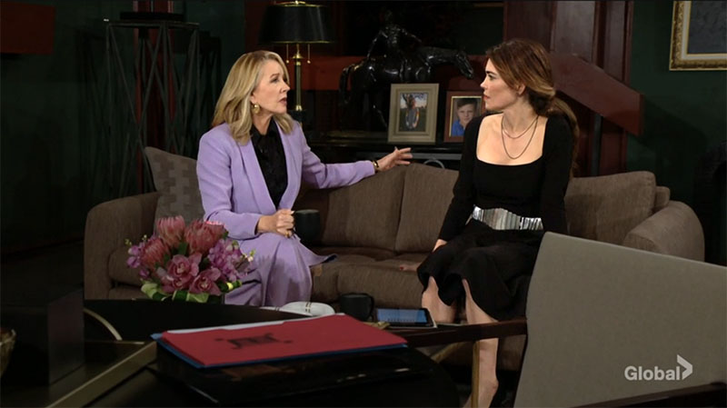 nikki updates victoria as they sit on the couch at newman enterprises.