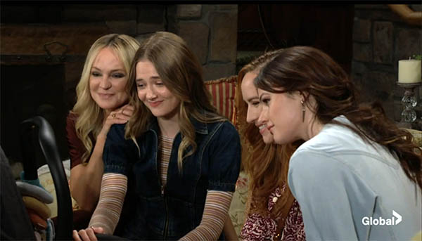 sharon, faith, mariah, and tessa enjoy baby aria on young and the restless.