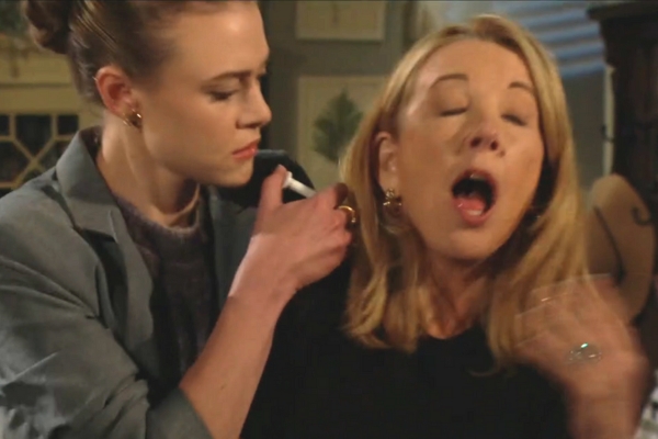 young and the restless claire shoots a syringe into nikki's neck.