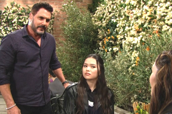 soap operas bold and the beautiful bill stands while luna and poppy sit.