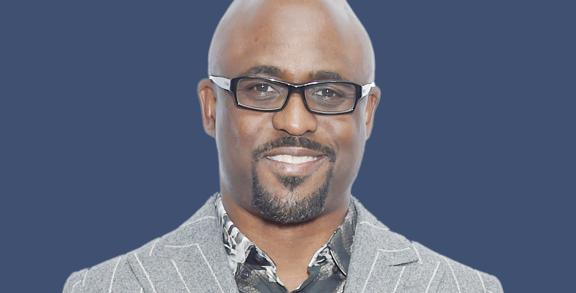 bold and the beautiful alum wayne brady against a blue background.