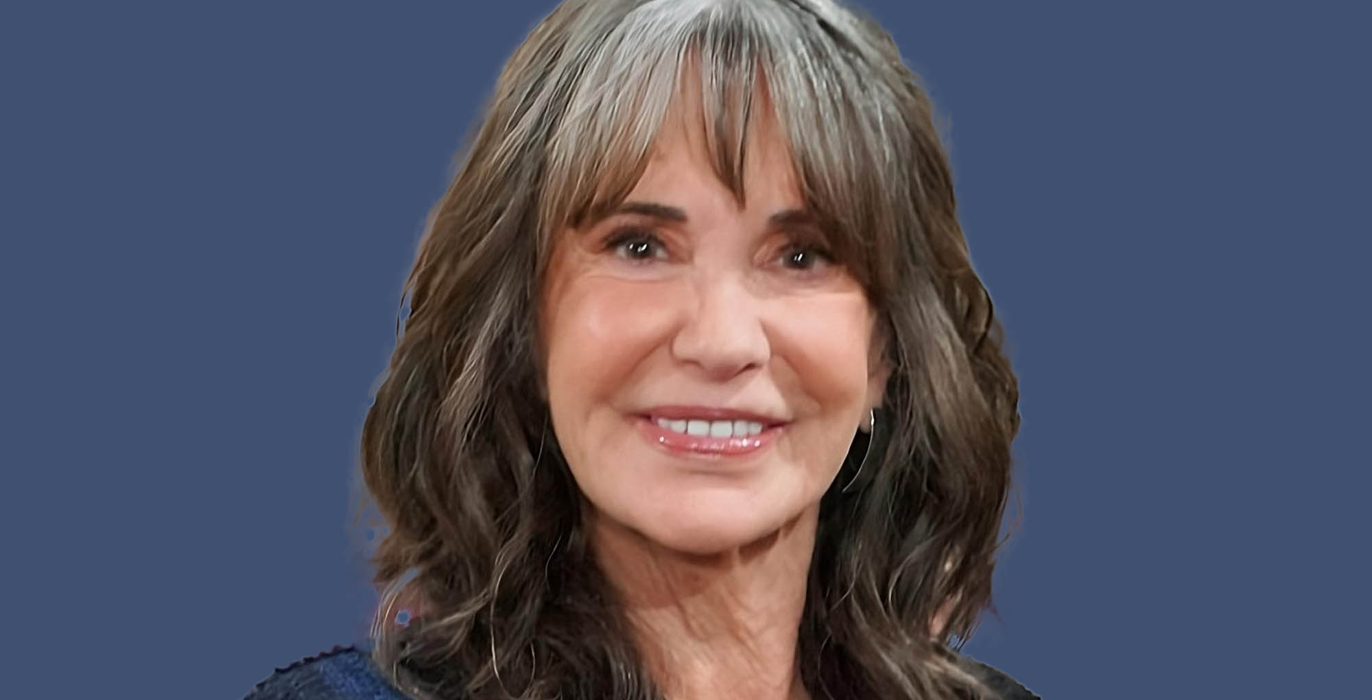 the young and the restless jess walton against a blue background.