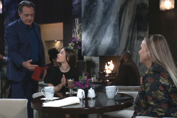 general hospital laura with scott and lucy in background.