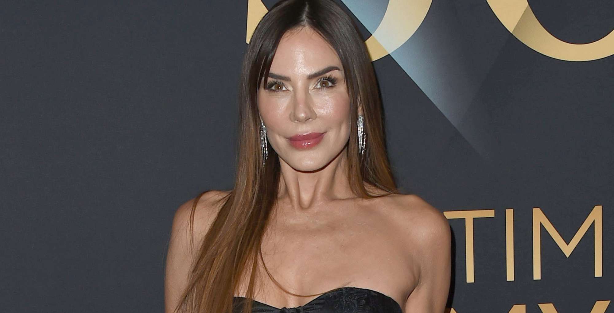 bold and the beautiful alum krista allen posing on the 50th daytime emmys red carpet.