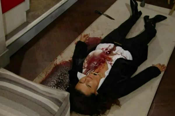 Sheila Carter bloody on the floor.