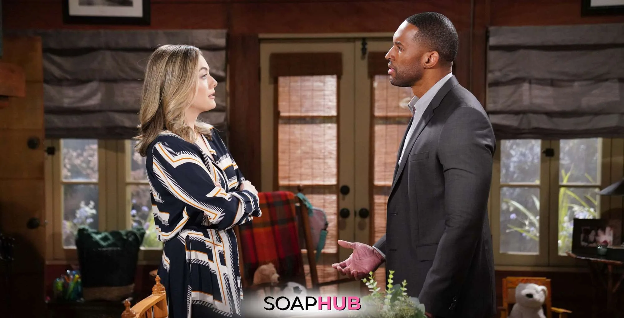 Bold and the Beautiful's Carter and Hope with the SoapHub logo.