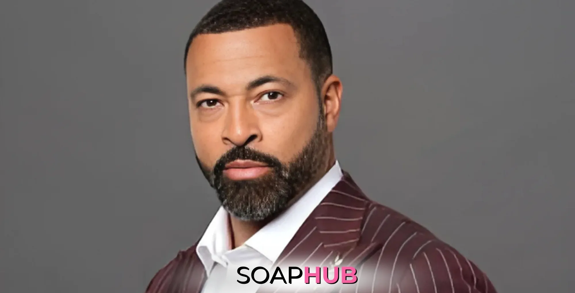 Beyond the Gates star Timon Kyle Durrett, who plays Bill Hamilton, with the Soap Hub logo