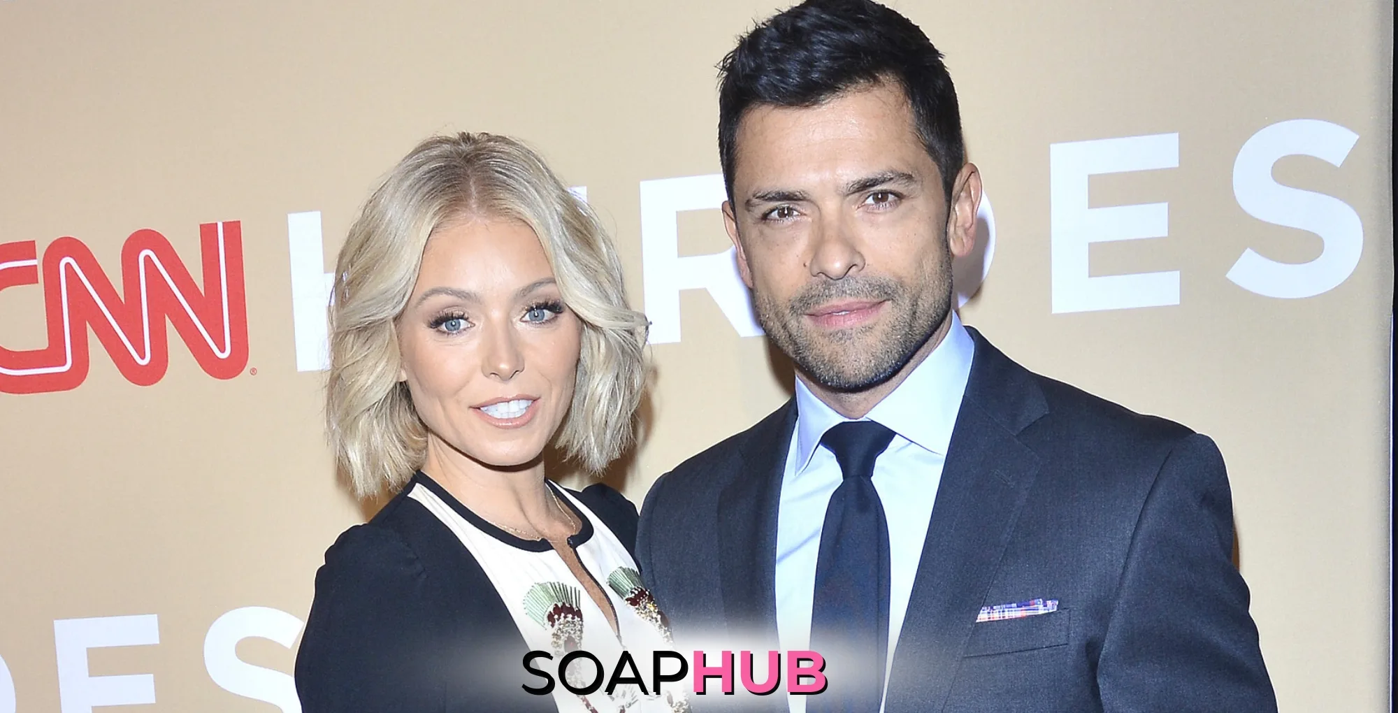 Kelly Ripa and Mark Consuelos with the Soap Hub logo.