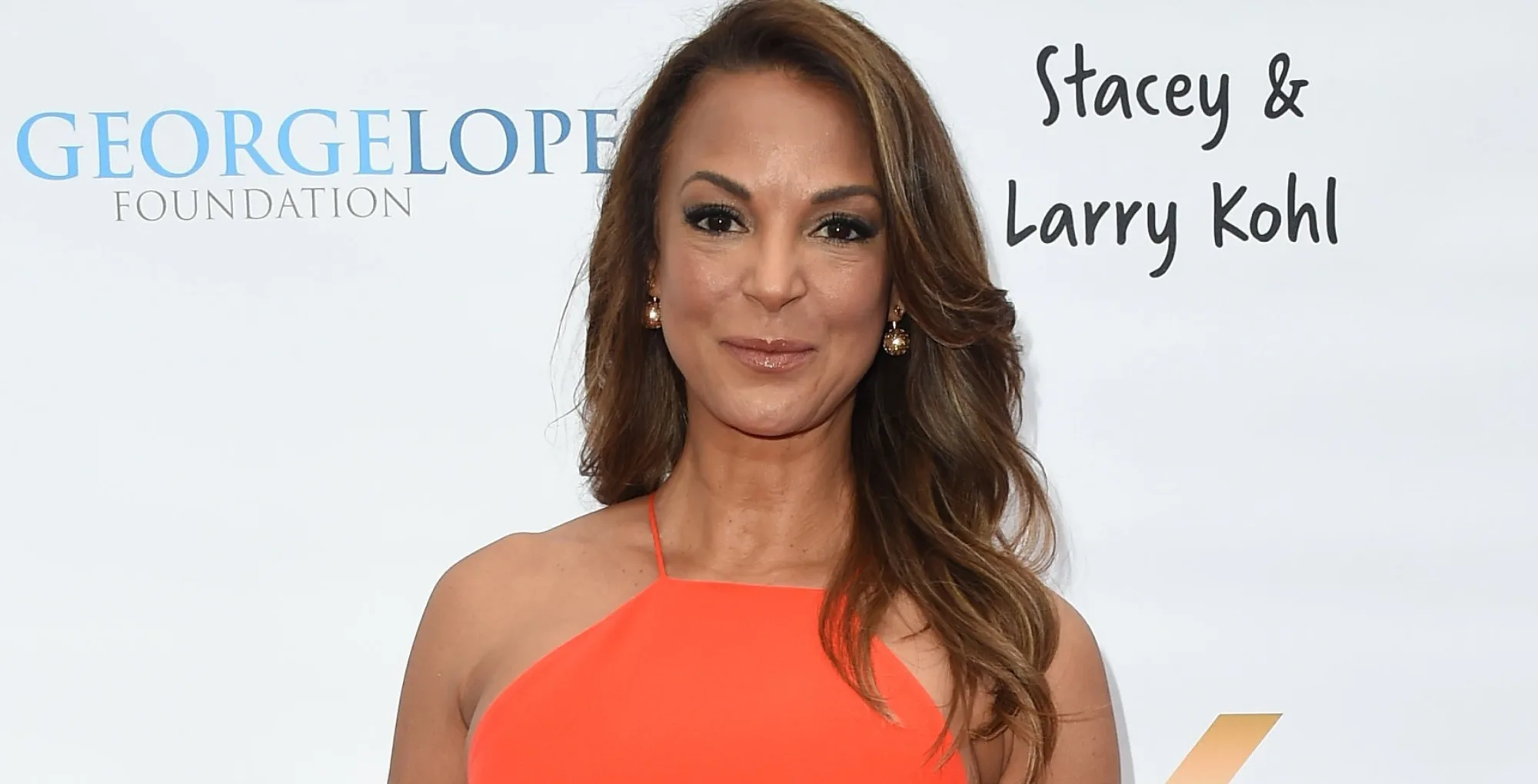 General Hospital Eva LaRue with the Soap Hub logo