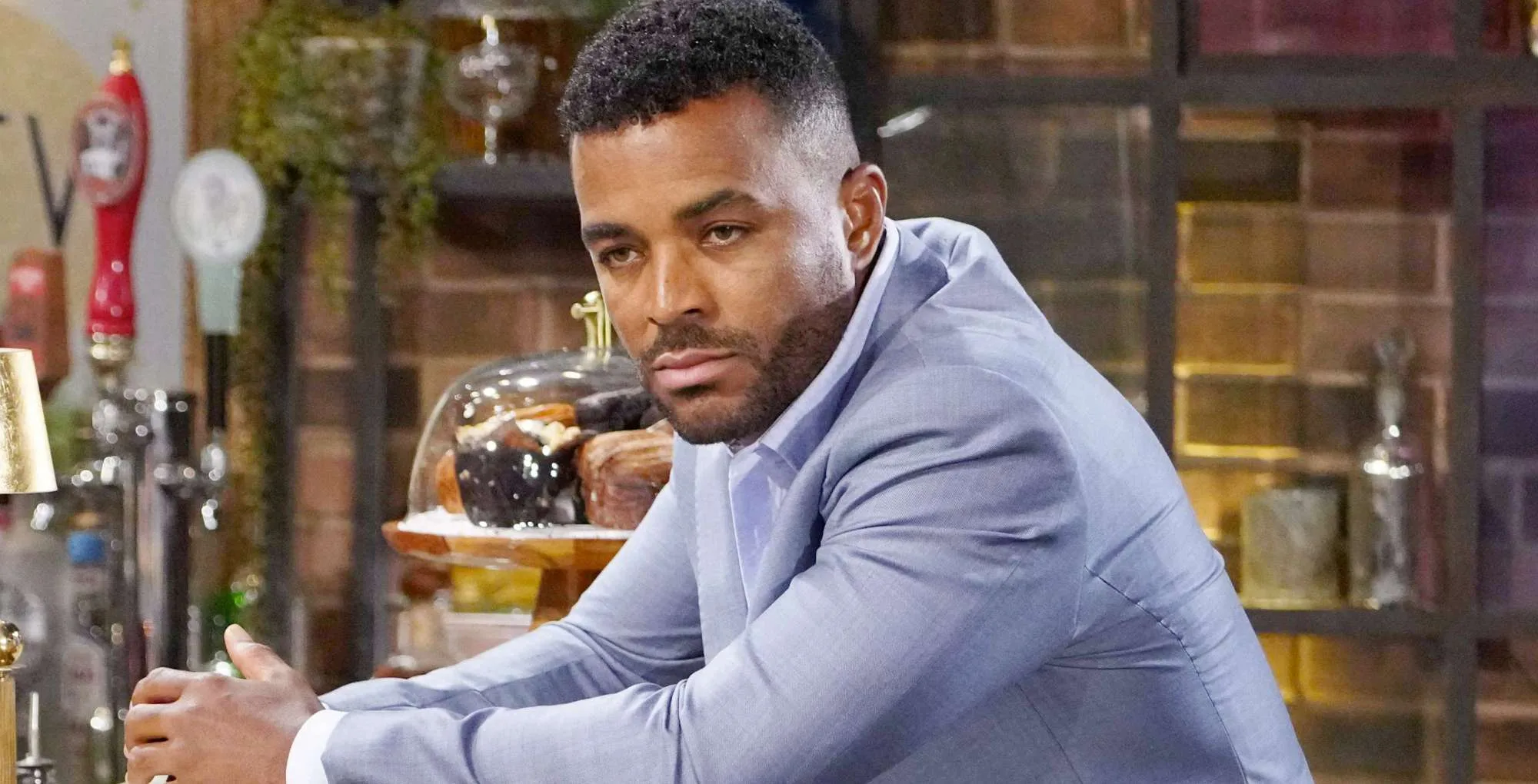 The Young and the Restless August 20 Nate sits at the bar at Society.