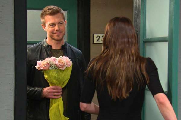 Jeremy Horton brings Stephanie Johnson flowers.