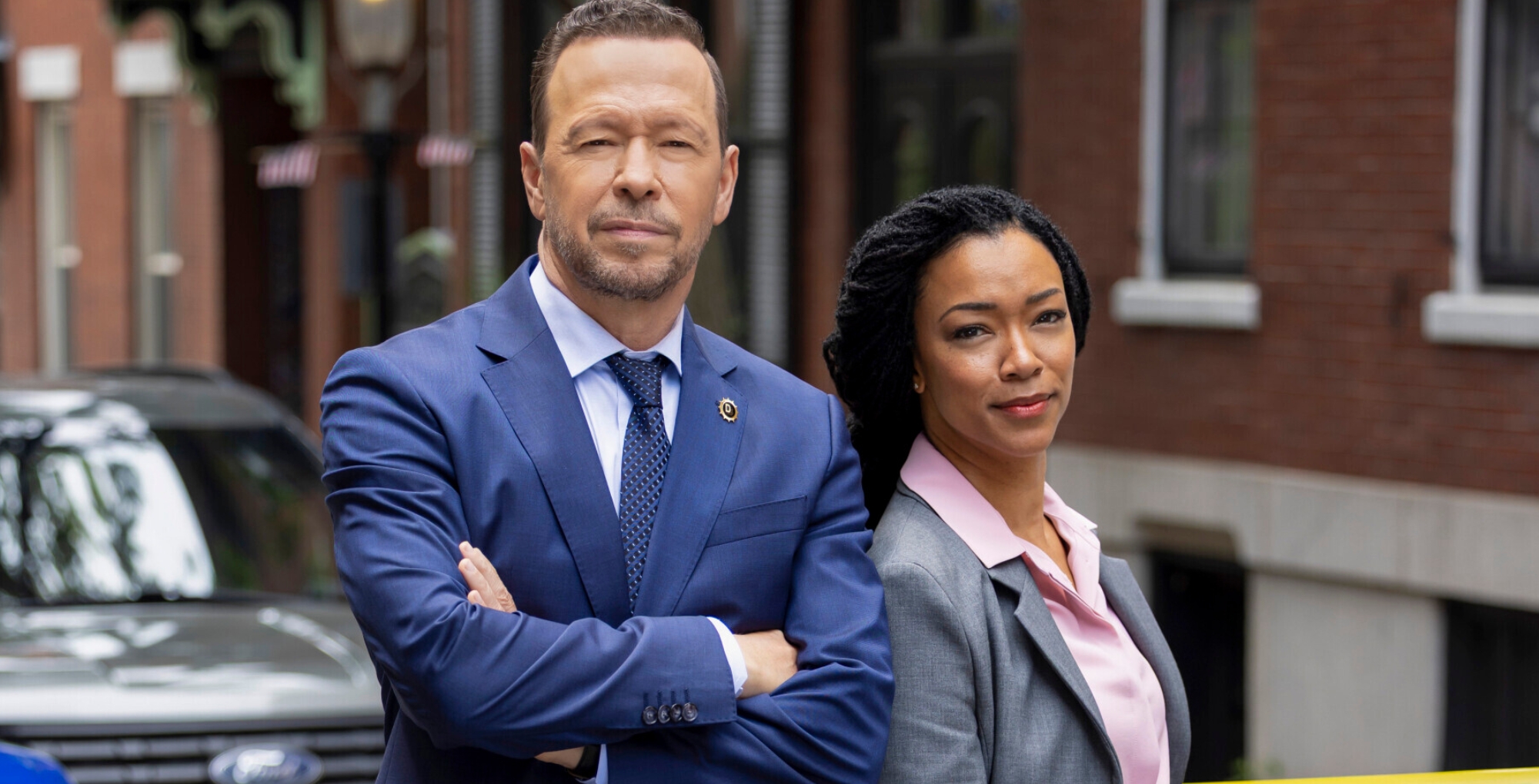 Donnie Wahlberg as Danny Reagan and Sonequa Martin-Green as Lena Silver on Boston Blue.